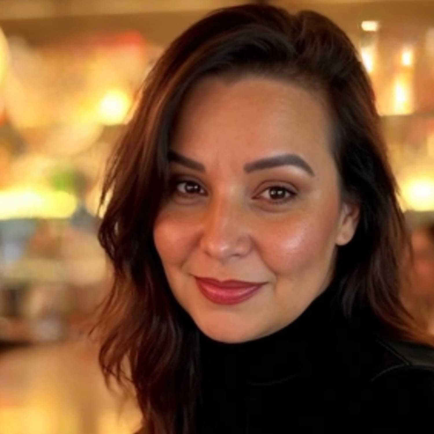 Portrait of Marianne Martinez, a professional stylist at Onda Salon, showcasing their expertise and style.
